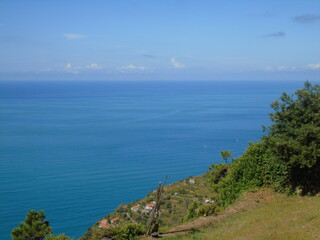 Obraz premium Liguria, Italy - 09/01/2020: Steep stairway overlooking the sea leading to the town of Monesteroli, in Liguria.