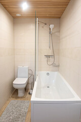 Fragment with shower and wc of a luxury modern bathroom in apartment