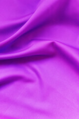 Fototapeta na wymiar Smooth elegant lilac silk or satin texture. Luxurious backdrop design
