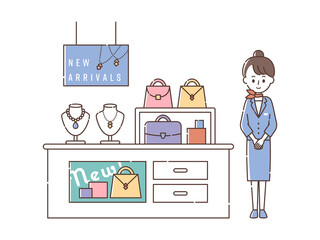 ブランドショップで接客する女性スタッフ