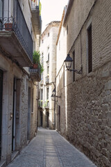 Fototapeta na wymiar The beautiful medieval architecture and narrow streets of ancient town of Girona, Spain