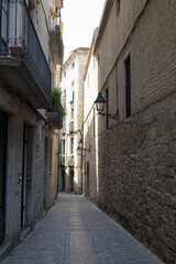 Fototapeta na wymiar The beautiful medieval architecture and narrow streets of ancient town of Girona, Spain
