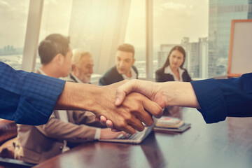 Obraz premium Close up people hands shake business partnership success,Shake hand concept