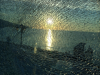 broken glass at sunset. background