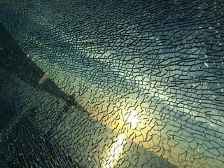 broken glass at sunset. background