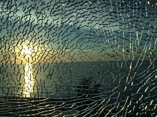 broken glass at sunset. background
