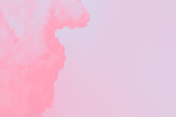 Obraz premium Blurred pink cloud on pale pink sky background, copy space