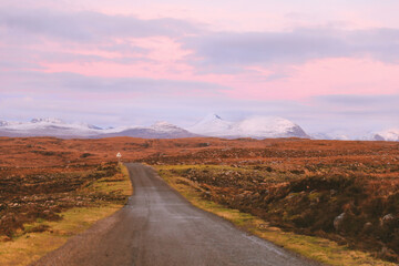 Country road at sunset, Applecross peninsula, Scottish highlands,