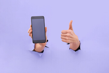Like and smartphone. Copy space on the smartphone screen, in trendy blue