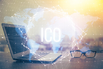 Double exposure of blockchain theme hologram and table with computer background. Concept of bitcoin...