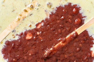 top view melted mung bean and red bean popsicles on a dish