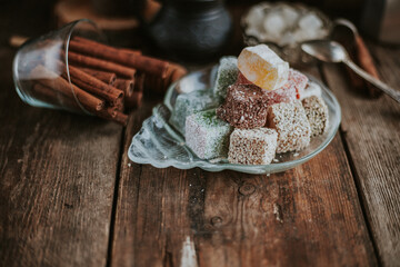Turkish Delight - a gelatinous sweet confection traditionally made of syrup and cornflour, dusted with icing sugar. Still life food - oriental sweet rahat lokum . Candy marshmallow.