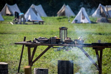 field soldier camp with guns and household items 1812