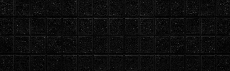 Panorama of Black stone block wall seamless background and pattern texture