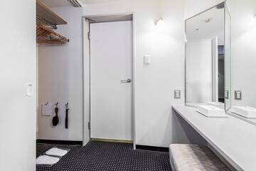 Make - up table inside a walk - in closet