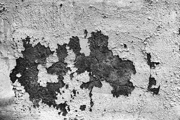 Texture of a concrete wall with cracks and scratches