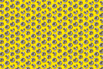 donuts on a yellow background top view. Flat lay of delicious nibbled chocolate donuts. used as donut banner or poster background, not pattern.