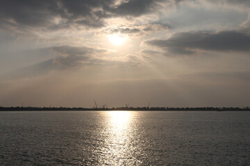 A breathtaking view of the sunset on the water