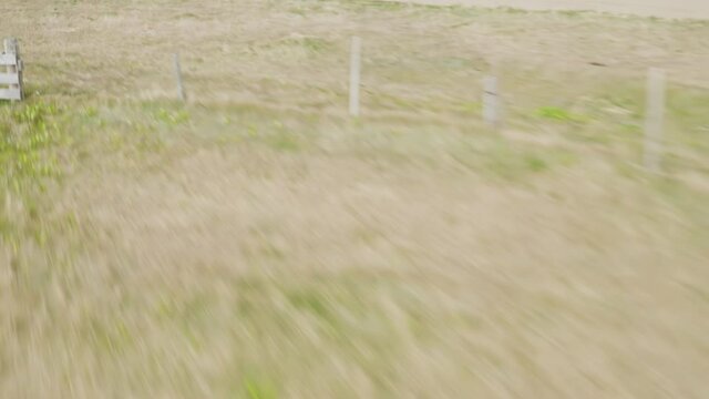 Fast moving aerial shot of Icelandic Westfjord landscape near Orlygshafnavegur. Overhead drone shot.