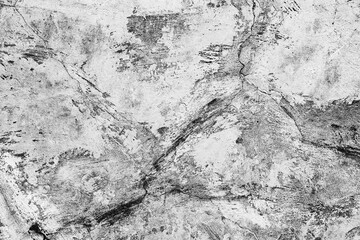 Texture of a concrete wall with cracks and scratches