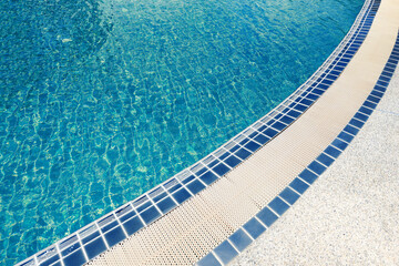 swimming pool tiles - most beautiful cool water in swimming pool background with blue tile