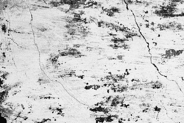 Texture of a concrete wall with cracks and scratches