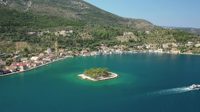 Aerial drone video of picturesque village capital and port of Ithaki or Ithaca island called Vathi a safe anchoring for sailboats, Ionian, Greece
