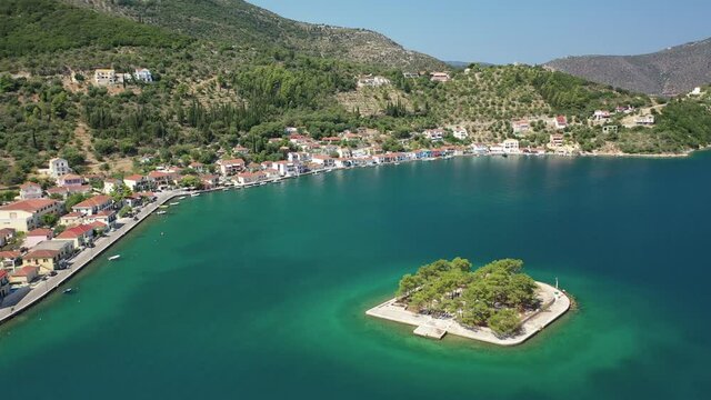 Aerial drone video of picturesque village capital and port of Ithaki or Ithaca island called Vathi a safe anchoring for sailboats, Ionian, Greece