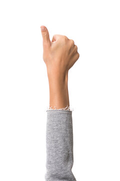 child's hand in fist with thumb open, white background