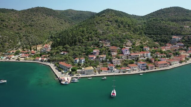 Aerial drone video of picturesque village capital and port of Ithaki or Ithaca island called Vathi a safe anchoring for sailboats, Ionian, Greece