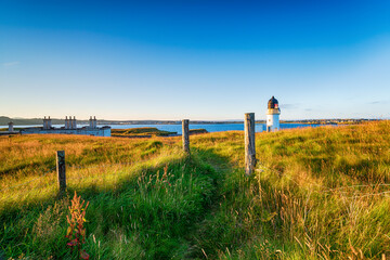 The lighthouse and coastguard cottages at Arnish Point