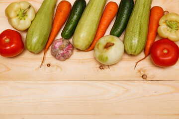 Summer frame with fresh organic vegetables and fruits on wooden background