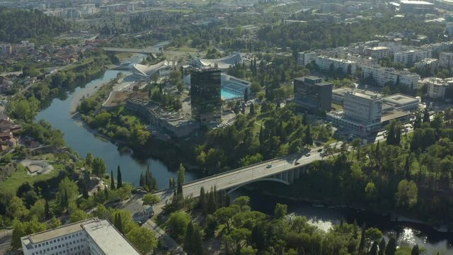 Podgorica, Montenegro - August, 2020: aerial view of Podgorica capital city of Montenegro. Drone shot on a panorama of the city where you can see the river bridges and the old city.