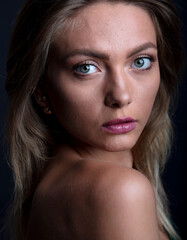Obraz premium portrait of a young woman, shooting in a photo studio