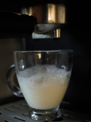 coffe with milk in a vintage coffe machine 