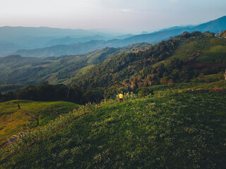 On the hill in the evening, the landscape, the mountain view and the purple and blue in the evening