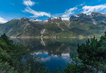 Fototapeta na wymiar Breathtaking landscapes along the Hardanger fjord and its inner branches, in the traditional Hardanger district of Vestland in Norway.
