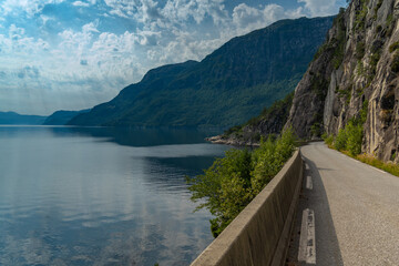 Breathtaking narrow roads along the Hardanger fjord and its inner branches, in the traditional Hardanger district of Vestland in Norway.