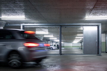 Underground parking. Cars parked in a garage with no people. Many cars in parking garage interior....