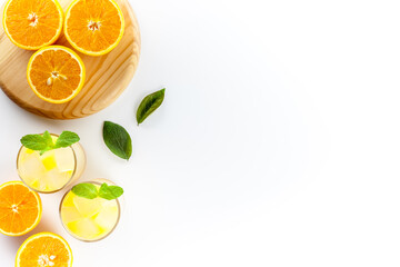 Glass of orange juice healthy drink on a white background top view copy space
