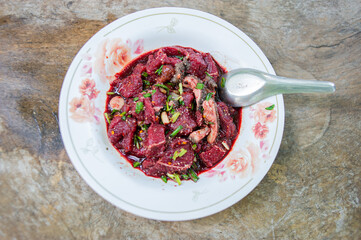 The meal is made from raw beef and mixed with cow blood.