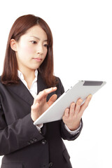 Fototapeta premium タブレットPCを見るＯＬ
