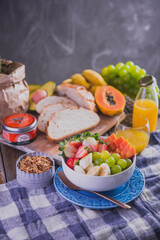 breakfast table with a bowl of fruits