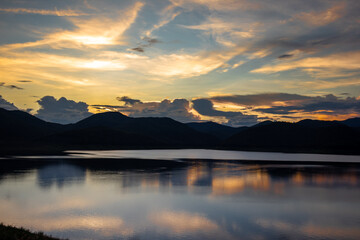 Fototapeta na wymiar Sunset on a mountain ,reservoir in Chiang Mai, Thailand