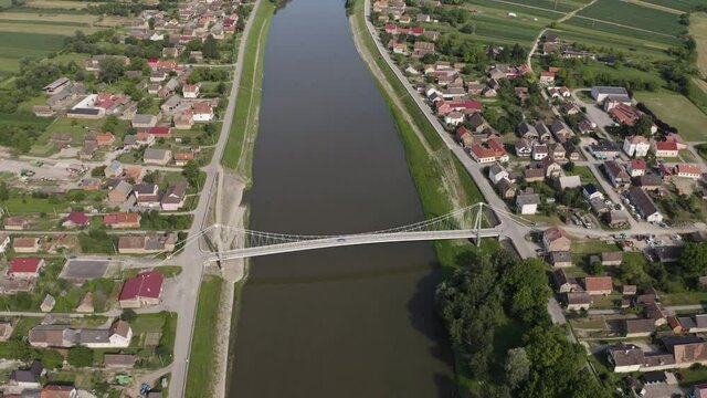 Aerial view of Martinska Ves bridge crossing Sava river at countryside Croatia.