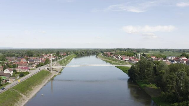 Aerial view of Martinska Ves bridge crossing Sava river at countryside Croatia.