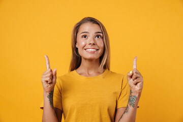 Happy woman showing copy space isolated