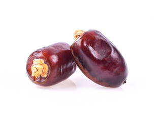Dry date palm fruit on white background