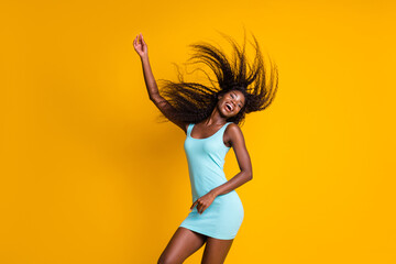 Photo portrait of cute active african american girl dancing with one hand in air hair flying...
