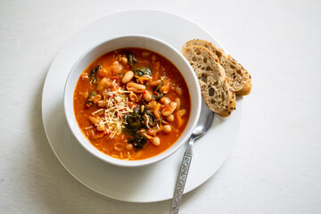 Homemade Ribollita, tuscan bean soup with light rye ciabatta